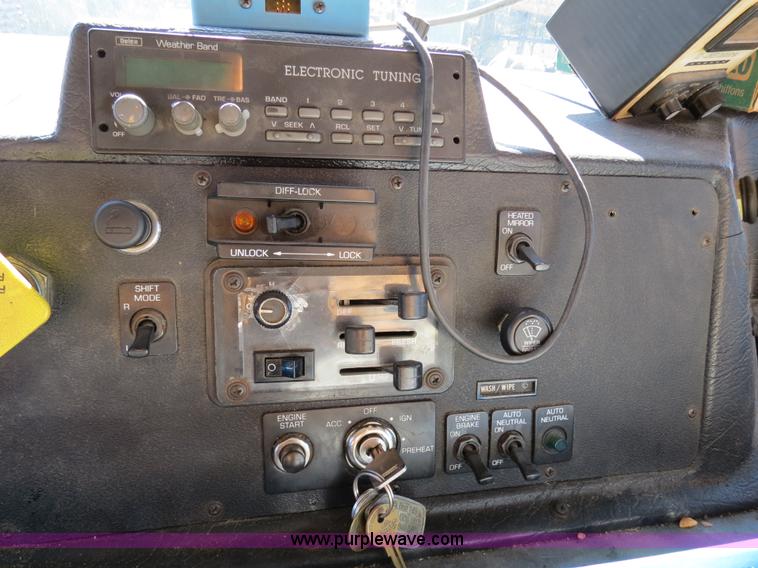 image for item B4643 1997 Volvo WX64 Ezliner paint striper truck