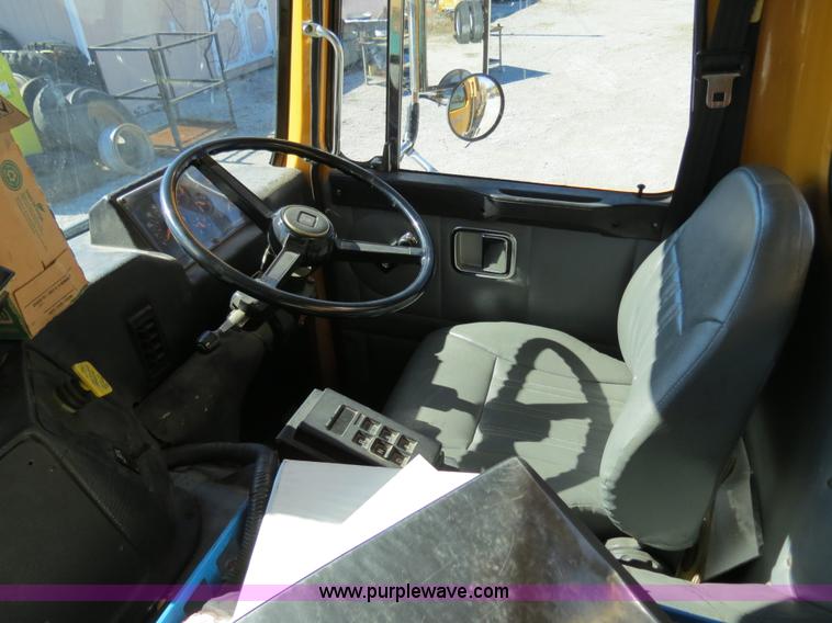 image for item B4643 1997 Volvo WX64 Ezliner paint striper truck