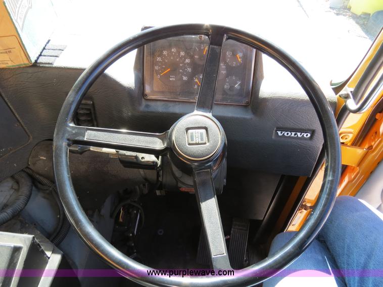 image for item B4643 1997 Volvo WX64 Ezliner paint striper truck