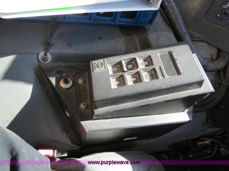 image for item B4643 1997 Volvo WX64 Ezliner paint striper truck