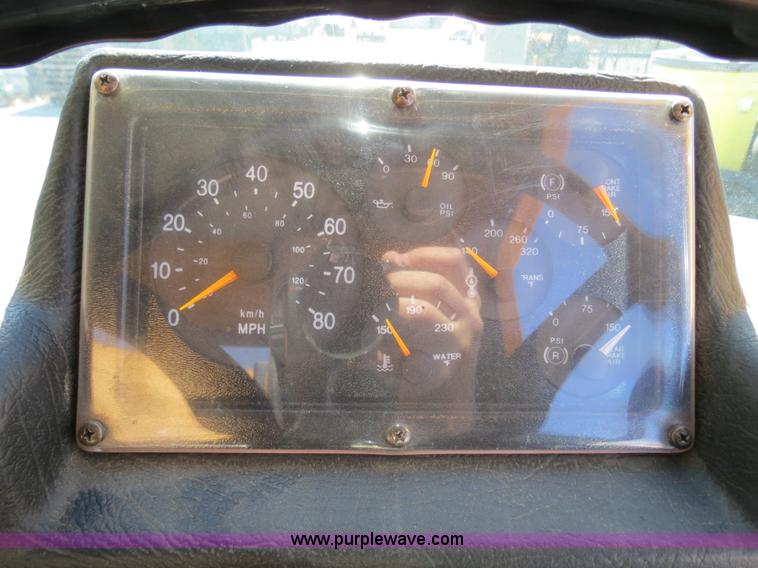 image for item B4643 1997 Volvo WX64 Ezliner paint striper truck