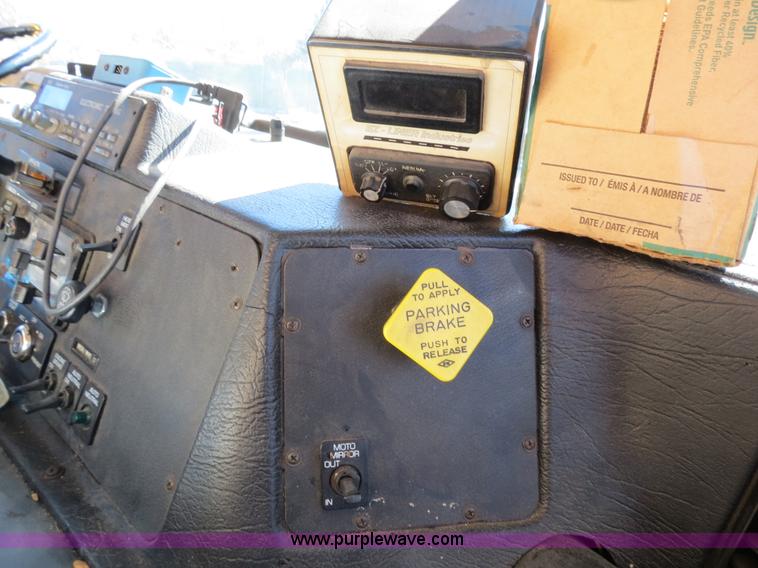 image for item B4643 1997 Volvo WX64 Ezliner paint striper truck