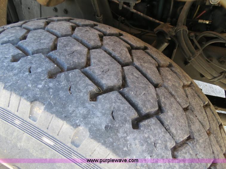 image for item B4643 1997 Volvo WX64 Ezliner paint striper truck