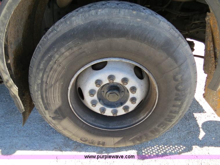 image for item B4643 1997 Volvo WX64 Ezliner paint striper truck