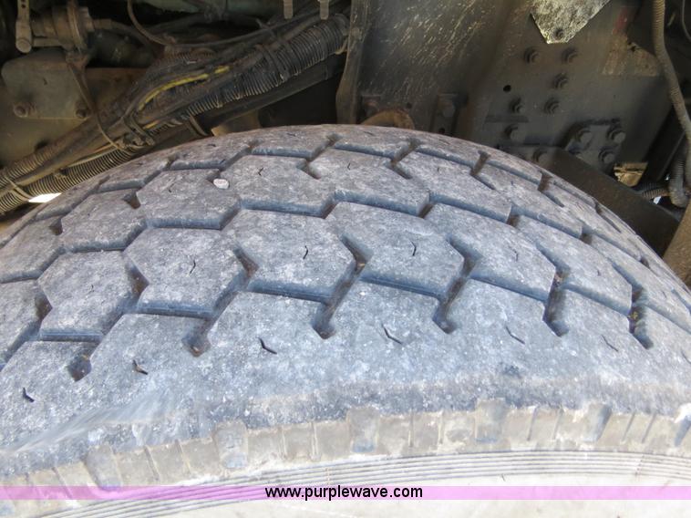 image for item B4643 1997 Volvo WX64 Ezliner paint striper truck