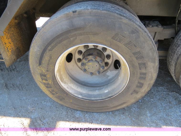 image for item B4643 1997 Volvo WX64 Ezliner paint striper truck