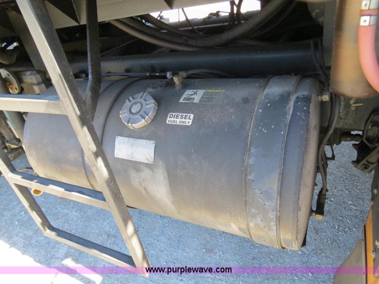 image for item B4643 1997 Volvo WX64 Ezliner paint striper truck