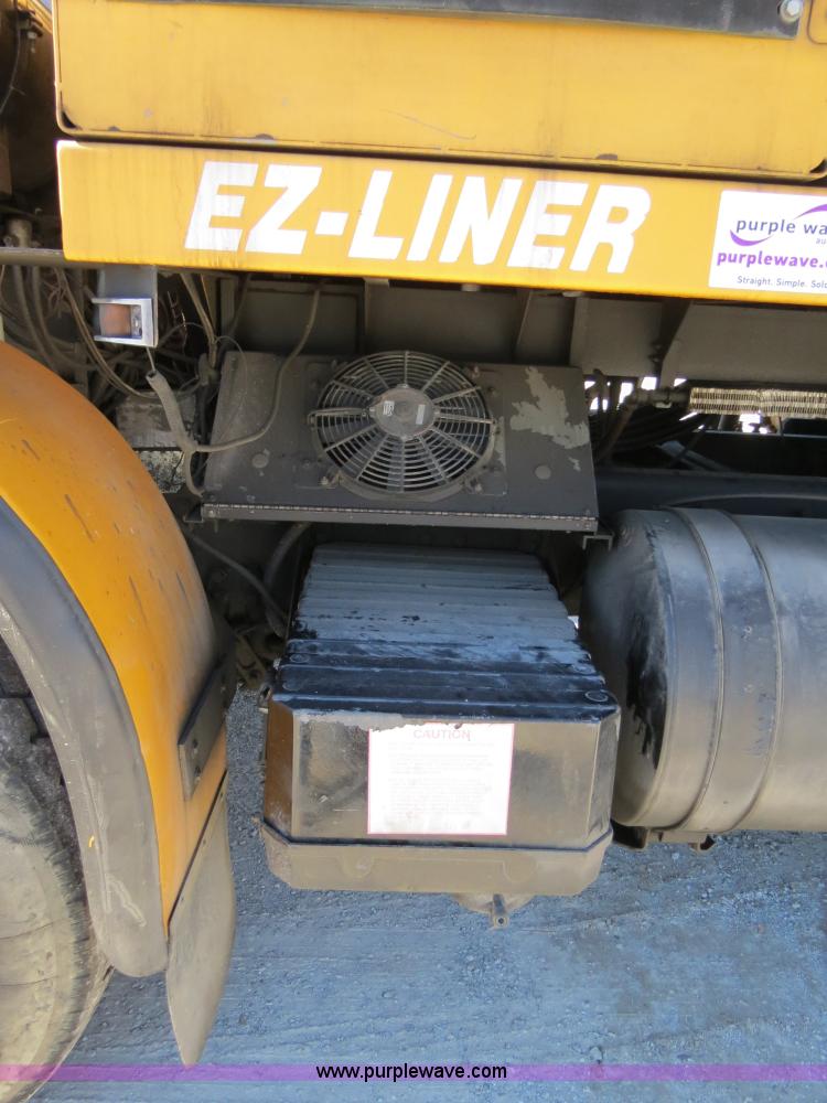 image for item B4643 1997 Volvo WX64 Ezliner paint striper truck