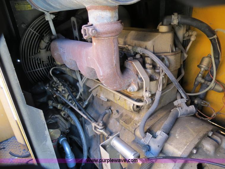 image for item B4643 1997 Volvo WX64 Ezliner paint striper truck