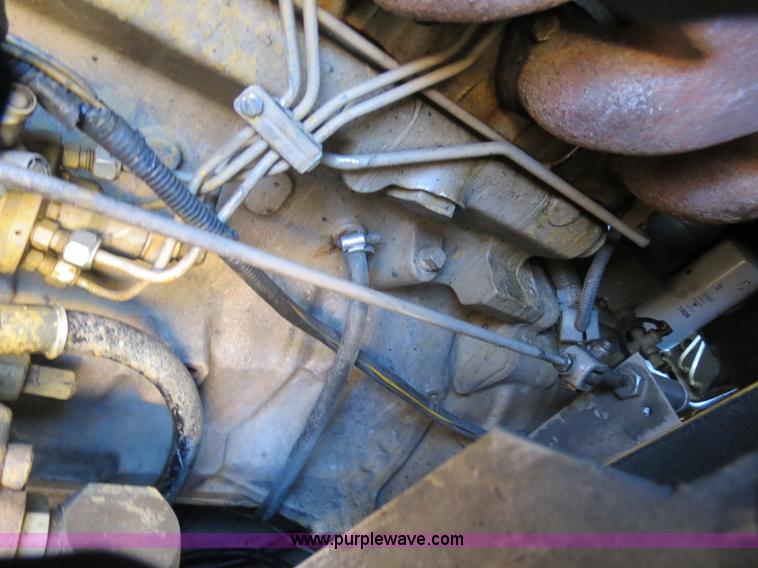 image for item B4643 1997 Volvo WX64 Ezliner paint striper truck