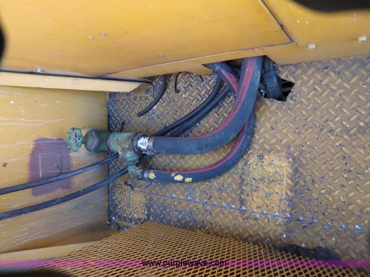 image for item B4643 1997 Volvo WX64 Ezliner paint striper truck