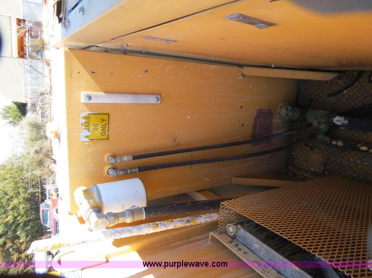 image for item B4643 1997 Volvo WX64 Ezliner paint striper truck