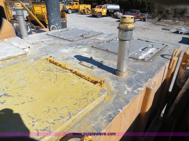 image for item B4643 1997 Volvo WX64 Ezliner paint striper truck