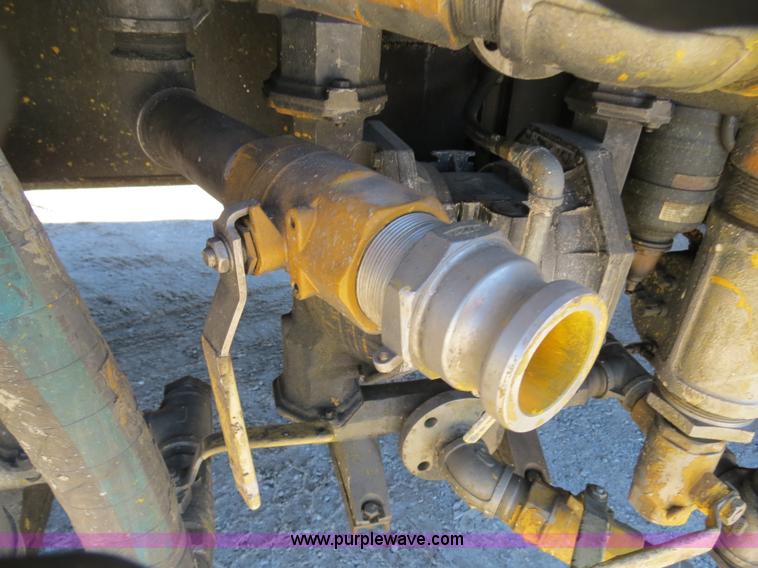 image for item B4643 1997 Volvo WX64 Ezliner paint striper truck