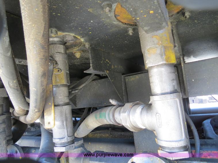 image for item B4643 1997 Volvo WX64 Ezliner paint striper truck