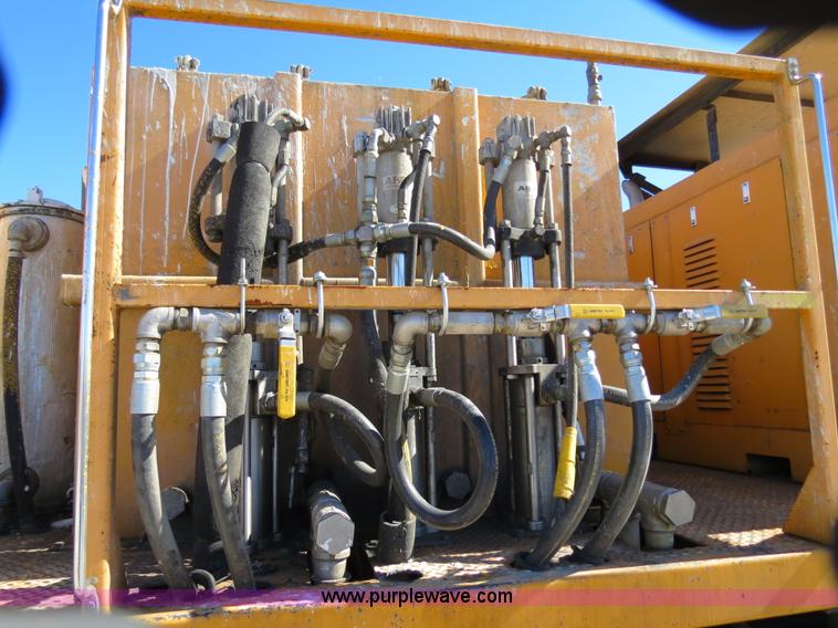 image for item B4643 1997 Volvo WX64 Ezliner paint striper truck