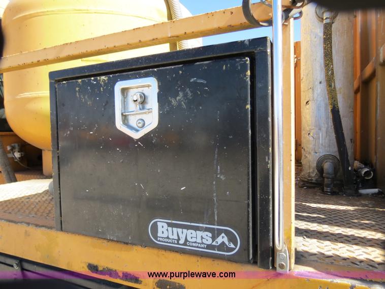 image for item B4643 1997 Volvo WX64 Ezliner paint striper truck