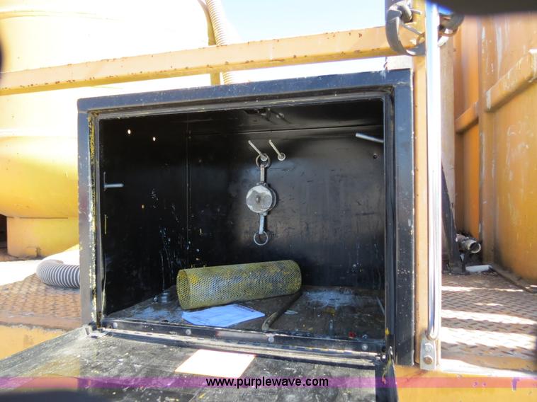 image for item B4643 1997 Volvo WX64 Ezliner paint striper truck