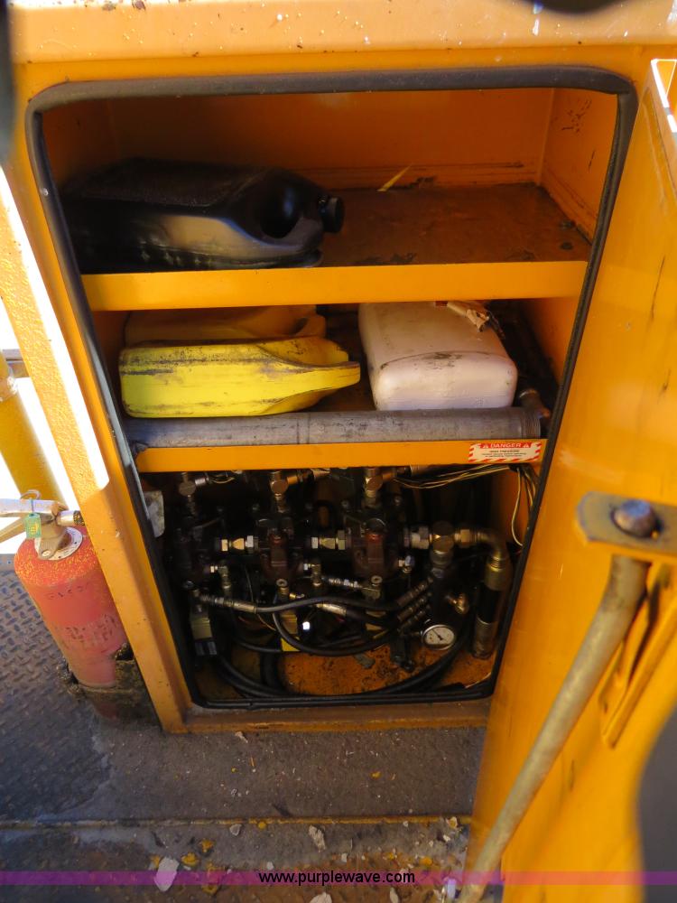 image for item B4643 1997 Volvo WX64 Ezliner paint striper truck