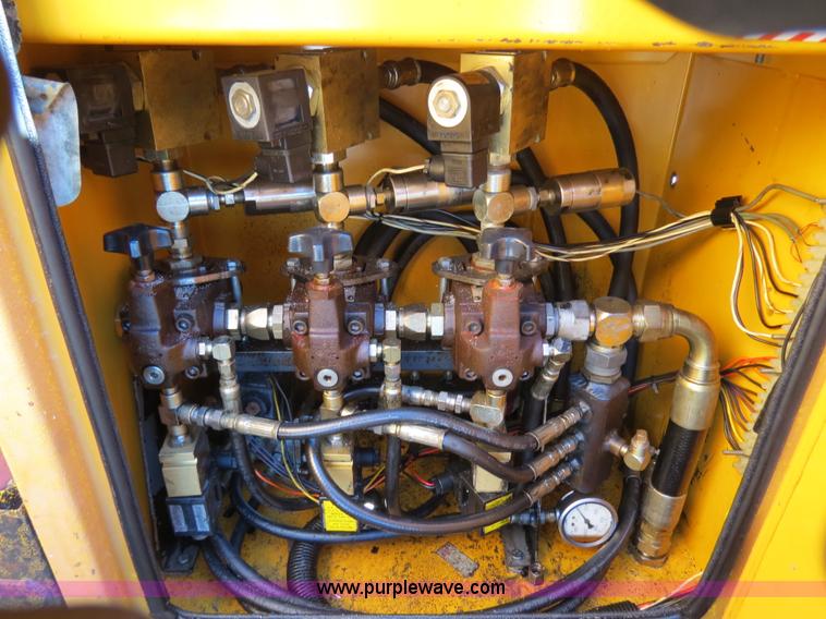 image for item B4643 1997 Volvo WX64 Ezliner paint striper truck