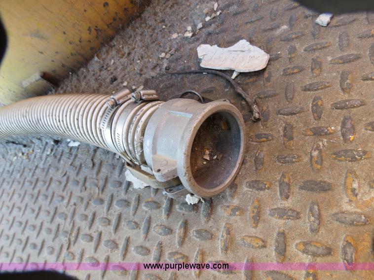 image for item B4643 1997 Volvo WX64 Ezliner paint striper truck