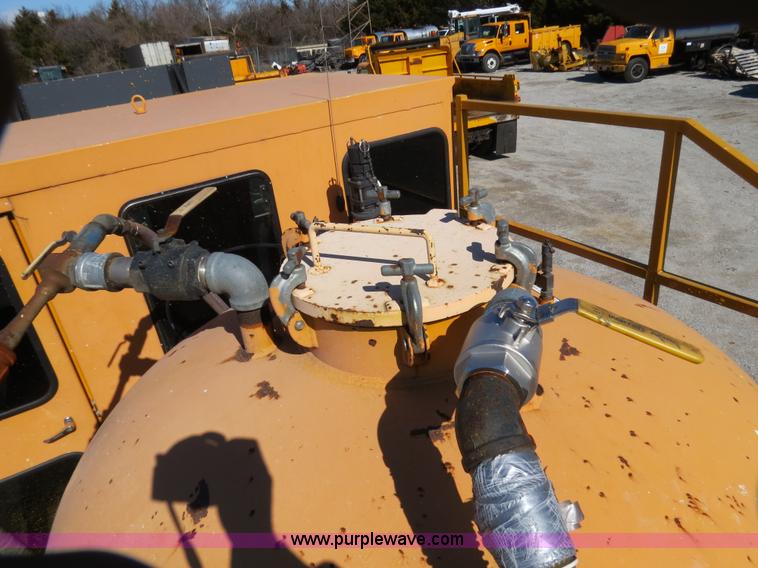 image for item B4643 1997 Volvo WX64 Ezliner paint striper truck