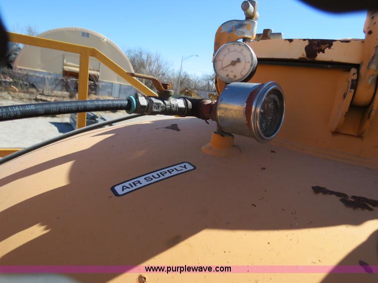 image for item B4643 1997 Volvo WX64 Ezliner paint striper truck