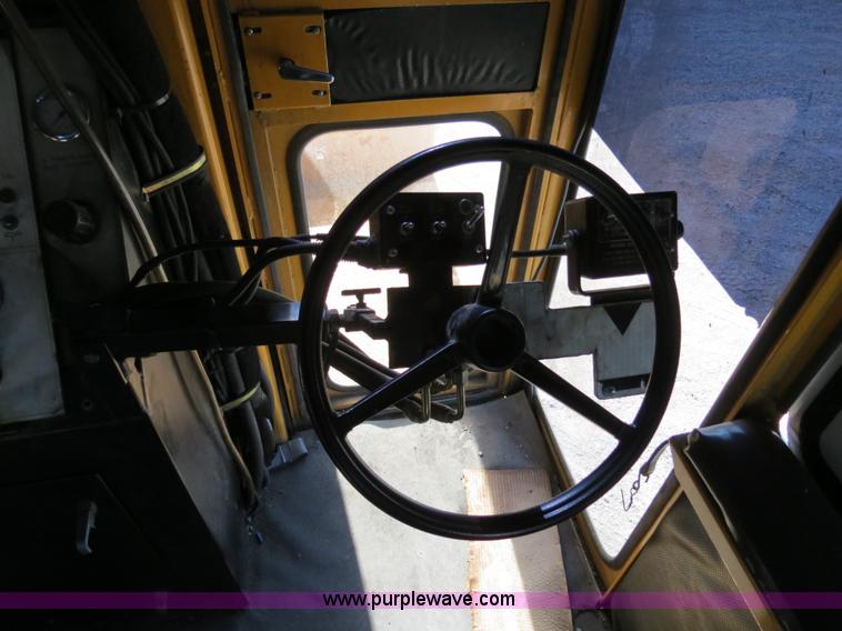 image for item B4643 1997 Volvo WX64 Ezliner paint striper truck