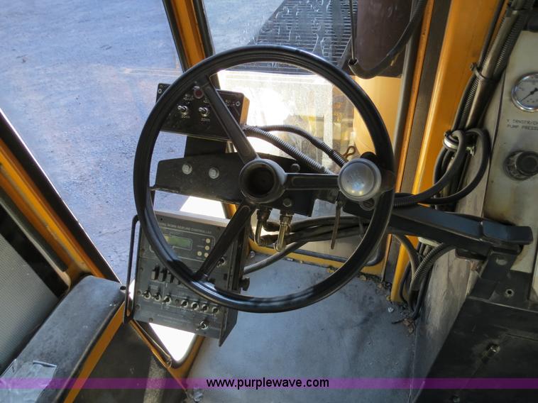 image for item B4643 1997 Volvo WX64 Ezliner paint striper truck