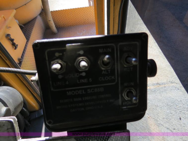 image for item B4643 1997 Volvo WX64 Ezliner paint striper truck