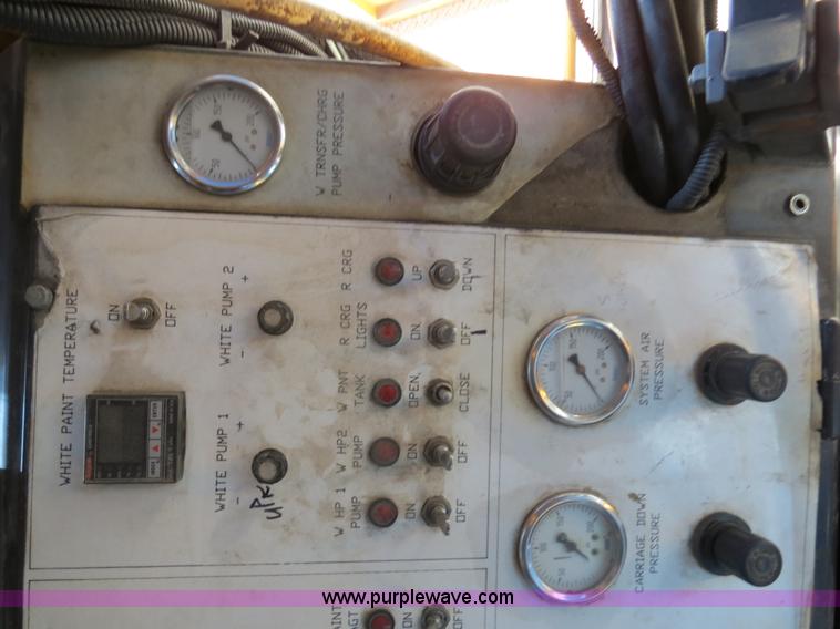 image for item B4643 1997 Volvo WX64 Ezliner paint striper truck