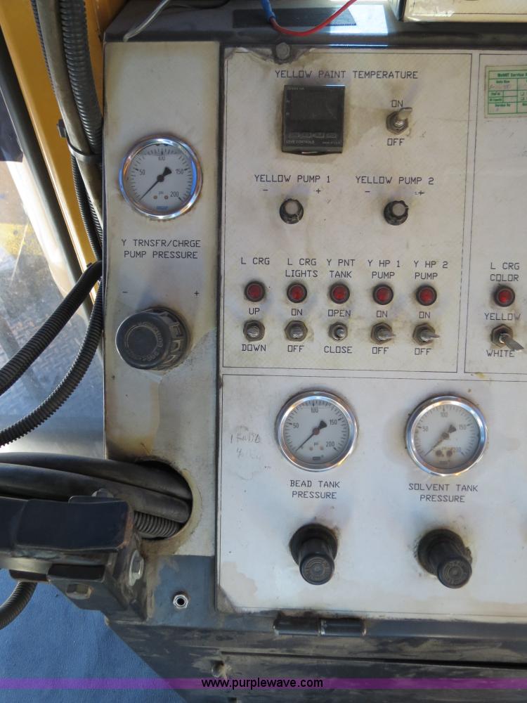 image for item B4643 1997 Volvo WX64 Ezliner paint striper truck