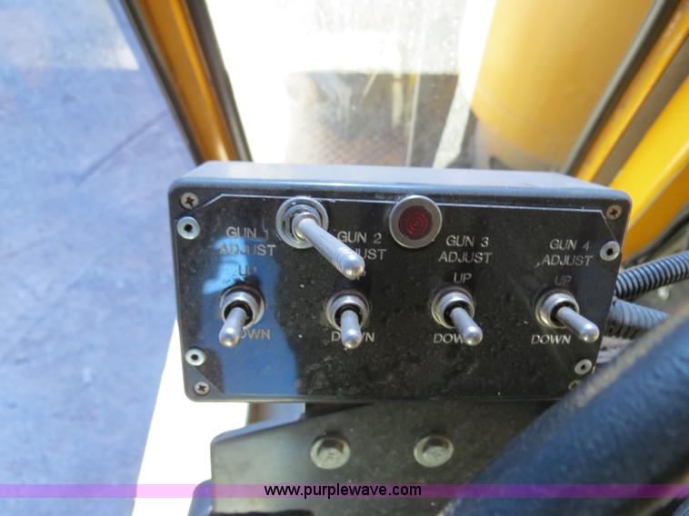 image for item B4643 1997 Volvo WX64 Ezliner paint striper truck