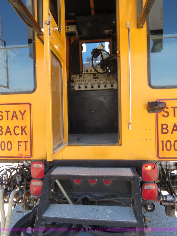 image for item B4643 1997 Volvo WX64 Ezliner paint striper truck