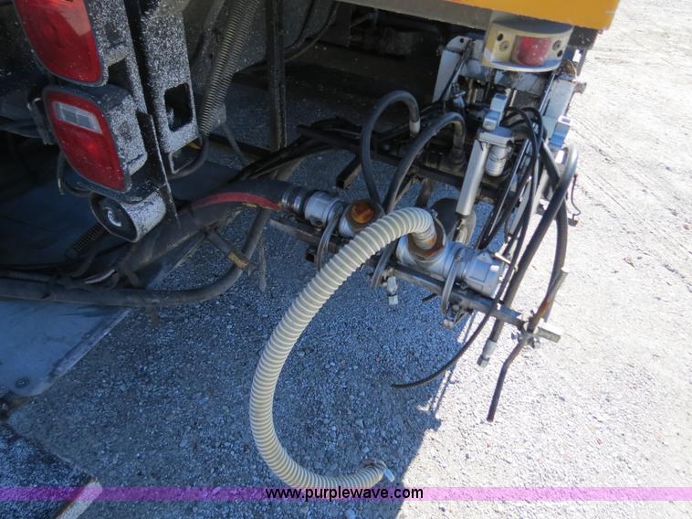 image for item B4643 1997 Volvo WX64 Ezliner paint striper truck