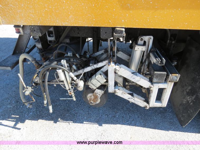 image for item B4643 1997 Volvo WX64 Ezliner paint striper truck