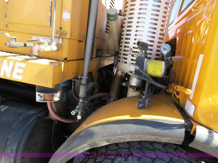 image for item B4643 1997 Volvo WX64 Ezliner paint striper truck