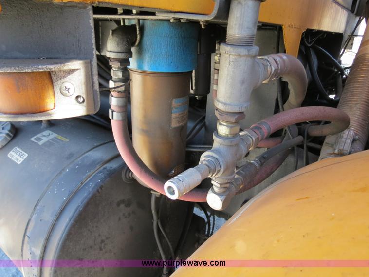 image for item B4643 1997 Volvo WX64 Ezliner paint striper truck