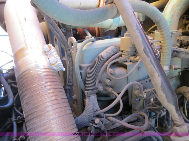 image for item B4643 1997 Volvo WX64 Ezliner paint striper truck