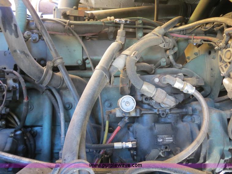 image for item B4643 1997 Volvo WX64 Ezliner paint striper truck