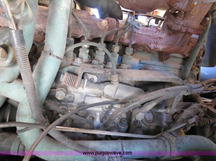 image for item B4643 1997 Volvo WX64 Ezliner paint striper truck