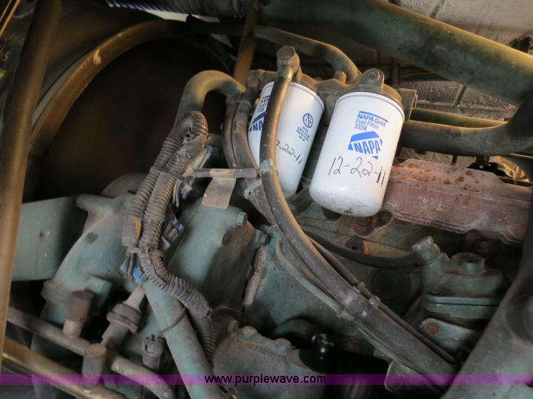 image for item B4643 1997 Volvo WX64 Ezliner paint striper truck