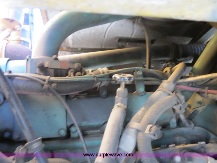 image for item B4643 1997 Volvo WX64 Ezliner paint striper truck