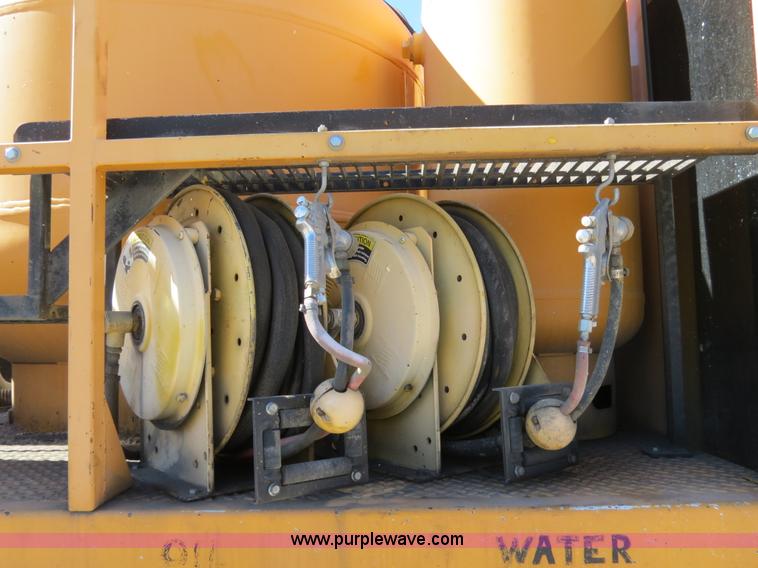 image for item B4643 1997 Volvo WX64 Ezliner paint striper truck