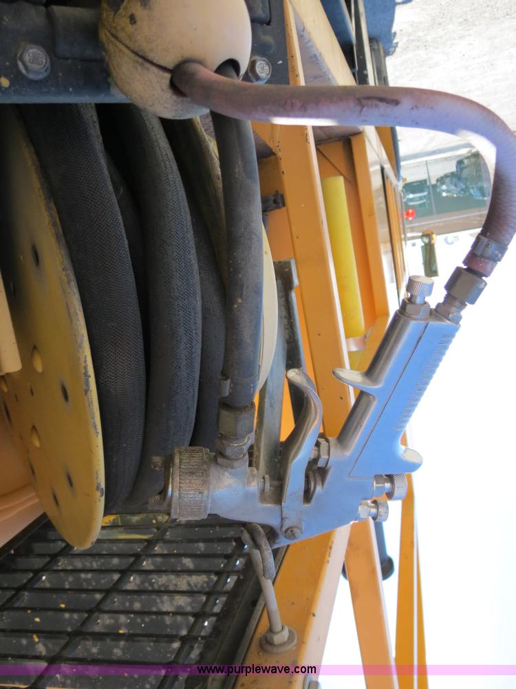 image for item B4643 1997 Volvo WX64 Ezliner paint striper truck