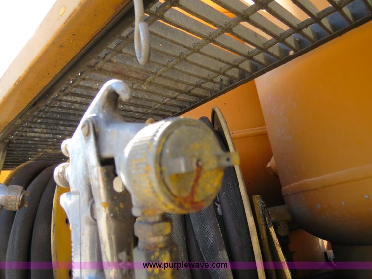 image for item B4643 1997 Volvo WX64 Ezliner paint striper truck