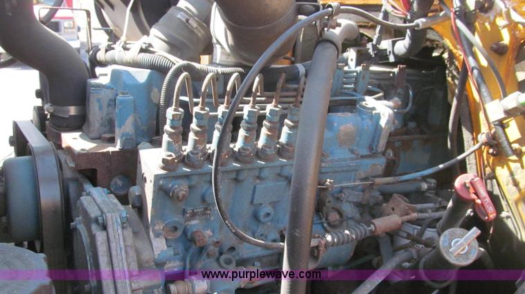 image for item E3866 1997 International 4900 CrewCab dump truck