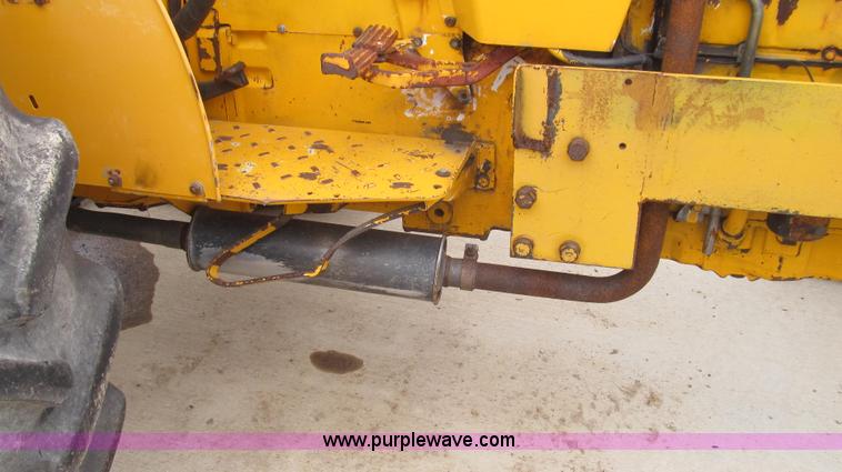 image for item E3867 1991 Case 595 tractor