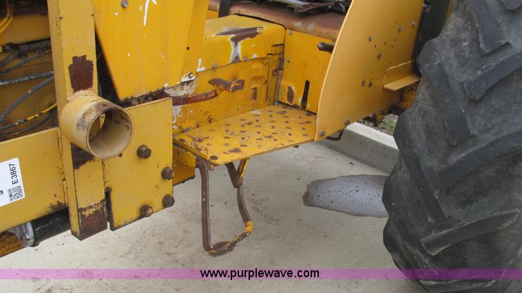 image for item E3867 1991 Case 595 tractor