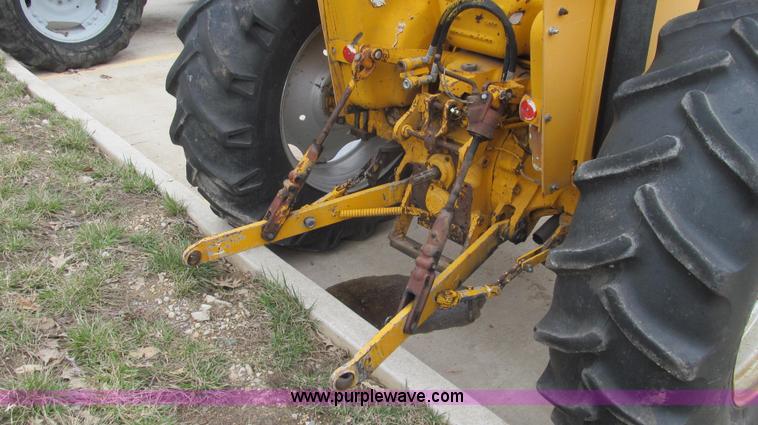 image for item E3867 1991 Case 595 tractor